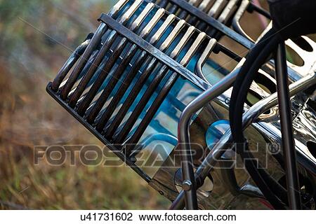 Stock Image - Close up of metal hot air balloon burner with flame, Todi Mongolfiere Hot Air Balloon Festival, Italy. Fotosearch