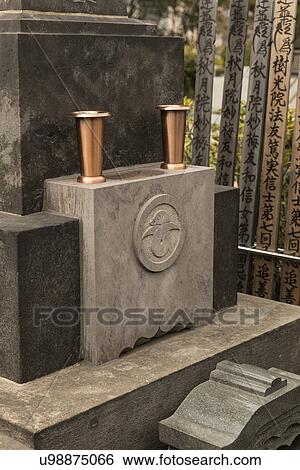 Tokyo, Japan: March 2, 2013 - Japanese gravestones in cemetery with traditional decoration, Tokyo, Japan View Large Photo Image Stock Photograph - Tokyo, Japan: March 2, 2013 - Japanese gravestones in cemetery with traditional decoration, Tokyo, Japan. Fotosearch