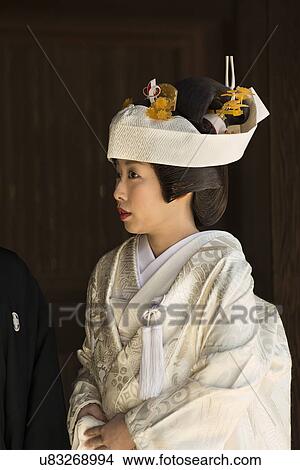 Tokyo, Japan: March 2, 2013 - Traditional Japanese wedding: portrait of bride closeup, showing traditional costume, Shinto Mehji shrine, Tokyo, Japan View Large Photo Image Picture - Tokyo, Japan: March 2, 2013 - Traditional Japanese wedding: portrait of bride closeup, showing traditional costume, Shinto Mehji shrine, Tokyo, Japan. Fotosearch