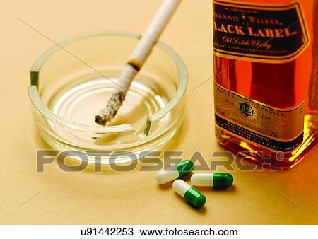 Stock Image - antidote, bottle, ash tray, alcohol. Fotosearch