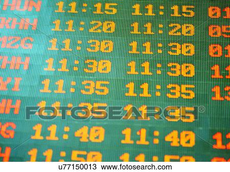 Stock Image - Arrival Departure Board, Data, Close-Up, Capital Letter, Airport. Fotosearch