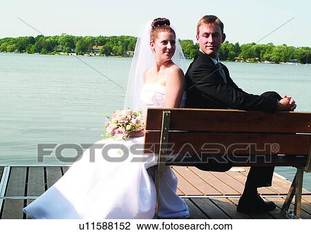 Back To Back, Bench, Bride, Brown Hair View Large Photo Image Stock Image - Back To Back, Bench, Bride, Brown Hair. Fotosearch