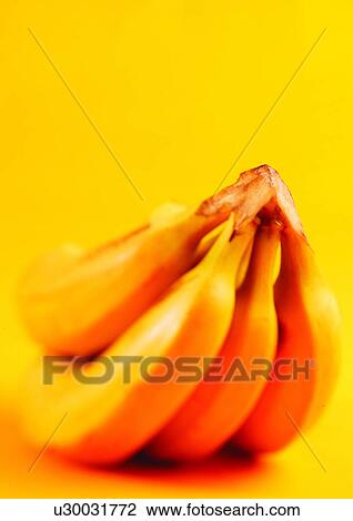 Stock Image - banana, blurred, close-up, fresh fruit. Fotosearch