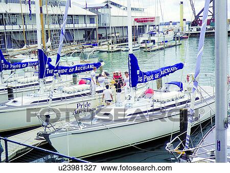 Stock Photo - Banner, Clouds, Day, Marina, Mast, Medium Group Of People. Fotosearch