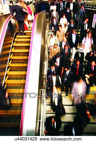 Bannister, Blurred, Carrying, Crowded, Escalator View Large Photo Image Stock Photo - Bannister, Blurred, Carrying, Crowded, Escalator. Fotosearch