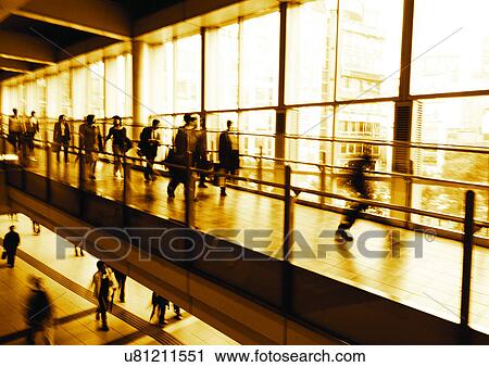 Stock Image - Bannister, Blurred, Casual Clothing, Concourse, Large Group Of People. Fotosearch