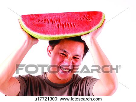 Stock Image - big, clenching teeth, close-up, cut. Fotosearch