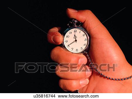 Picture - Black, Checking The Time, Holding, Human Fingers. Fotosearch