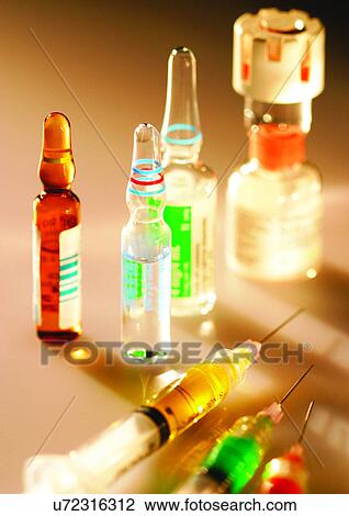 Stock Image - blur, bottles, development, device. Fotosearch