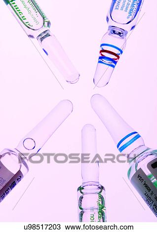 Stock Image - blur, bottles, device, dose. Fotosearch