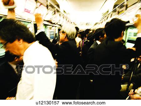 Stock Photo - Blurred, Bullet Train, Casual Clothing, Large Group Of People, Day. Fotosearch