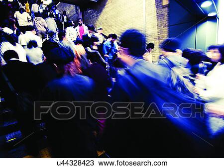 Stock Image - Blurred, Casual Clothing, Crowded, Day. Fotosearch