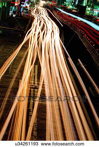 Blurred Motion, Building Exterior, City Street, Illuminated View Large Photo Image Stock Image - Blurred Motion, Building Exterior, City Street, Illuminated. Fotosearch