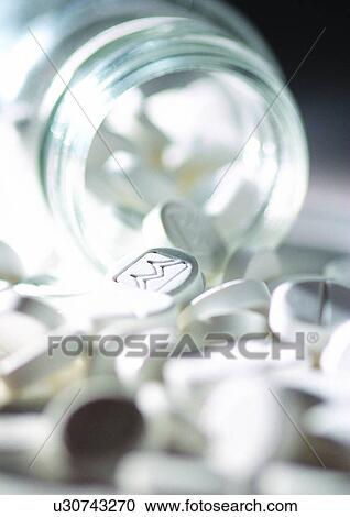 Stock Image - bottle, close-up, capsules, antidote. Fotosearch