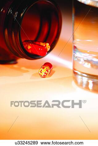 Stock Photo - bottle, close-up, capsules, antidote. Fotosearch