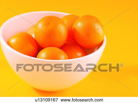 Stock Photo - bowl, citrus fruit, bowl of oranges, abundance. Fotosearch