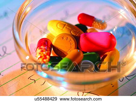 Stock Photo - bowl, container, capsules, antidote. Fotosearch