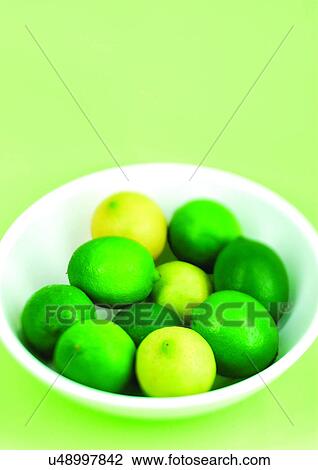 Stock Image - bowl of lemons, close-up, citrus fruit, abundance. Fotosearch