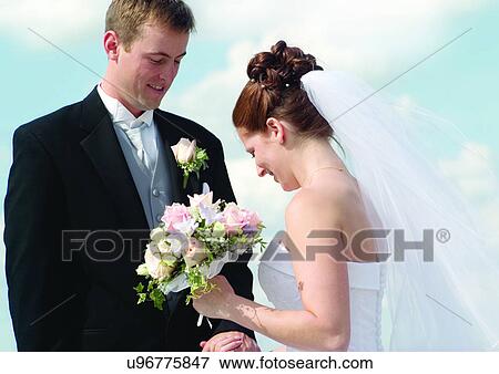 Brown Hair, Day, Full Suit, Hair Bun, Holding View Large Photo Image Stock Photo - Brown Hair, Day, Full Suit, Hair Bun, Holding. Fotosearch