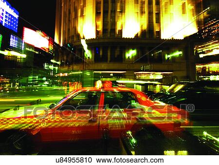 Stock Image - Building, Car, City, Dark, Glow Sign. Fotosearch