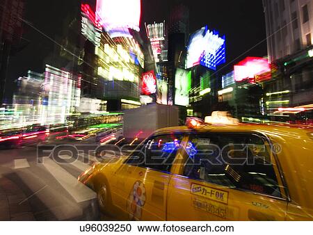 Stock Image - Building, Car, City, Dark, Glow Sign. Fotosearch