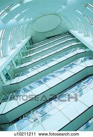 Stock Image - Building Exterior, Building Structure, Complex, Day, Directly Below. Fotosearch