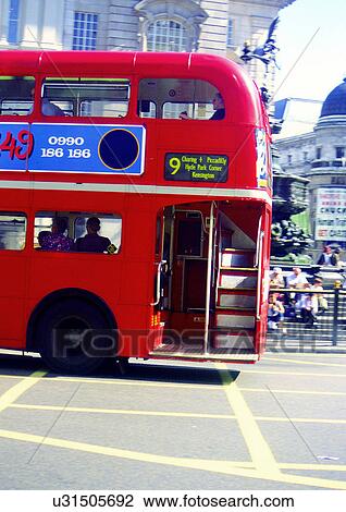Stock Image - Building Exterior, Bus, Day, Double Decker Bus, Group Of People. Fotosearch