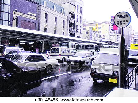 Stock Photograph - Building Exterior, Car, Crowded, Day, Driving. Fotosearch