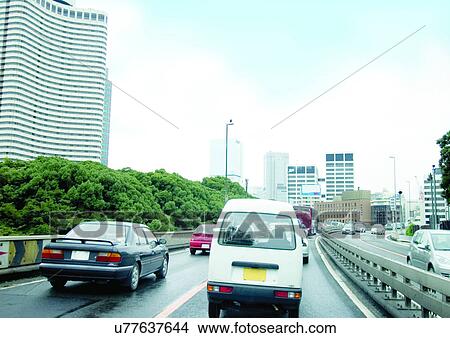 Buildings, Day, Clouds, Car, Arrow View Large Photo Image Picture - Buildings, Day, Clouds, Car, Arrow. Fotosearch