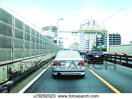 Buildings, Day, Clouds, Car, Arrow View Large Photo Image Stock Image - Buildings, Day, Clouds, Car, Arrow. Fotosearch