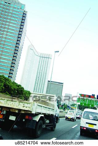 Picture - Buildings, Mode Of Transport, Day, Car, Arrows. Fotosearch