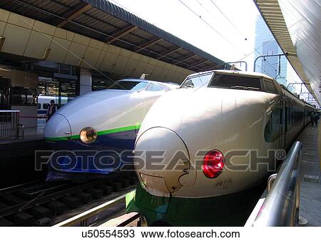 Stock Image - Bullet Train, Commuters, Day, Engine, Head Lights, High Speed Train. Fotosearch