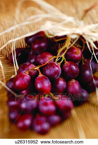 Stock Image - bunch of grapes, close-up, fresh fruit, freshness. Fotosearch