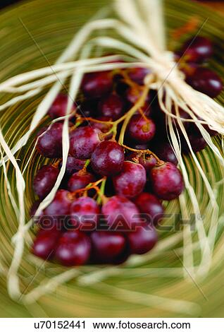Stock Image - bunch of grapes, close-up, fresh fruit, freshness. Fotosearch