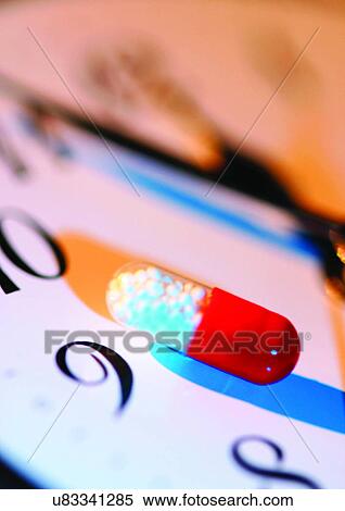 Stock Photography - capsule, course, clock, antidote. Fotosearch