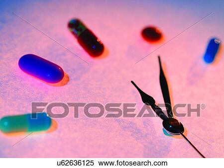 Stock Photography - capsules, course, clock, antidote. Fotosearch