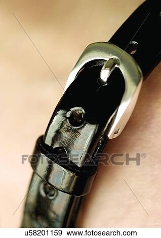 Stock Photo - close-up, still life, watch, tied. Fotosearch