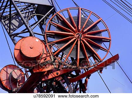 Stock Image - Cog, Bolt, Close-Up, Circular, Cables, Arm. Fotosearch