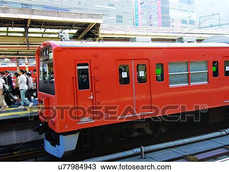 Stock Image - Commuter, Day, Large Group Of People, Mode Of Transport, Outdoor. Fotosearch