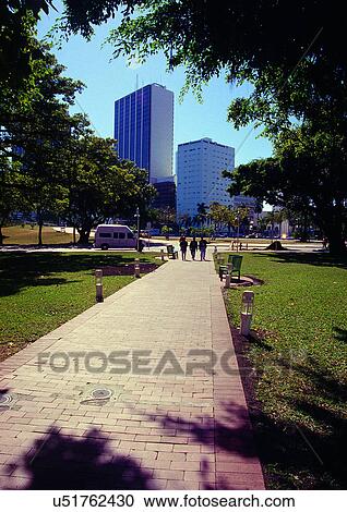 Stock Image - Day, Outdoor, Three People. Fotosearch