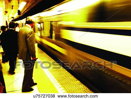Stock Photo - Formal Clothing, Commuter, Day, Part Of, Railroad Car, Subway Platform, Subway Station. Fotosearch