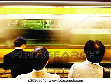 Stock Photograph - Formal Clothing, Day, Part Of, Railroad Car, Subway Platform, Subway Station. Fotosearch