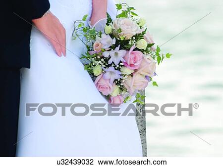 Holding, Standing, Full Suit, Wedding Dress, Close-Up View Large Photo Image Stock Image - Holding, Standing, Full Suit, Wedding Dress, Close-Up. Fotosearch