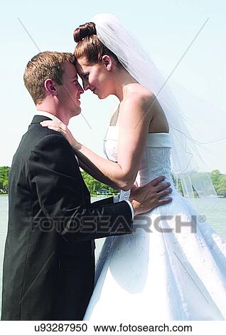 Holding, Standing, Smiling View Large Photo Image Stock Image - Holding, Standing, Smiling. Fotosearch