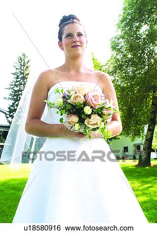Holding, Standing, Smiling View Large Photo Image Stock Photograph - Holding, Standing, Smiling. Fotosearch