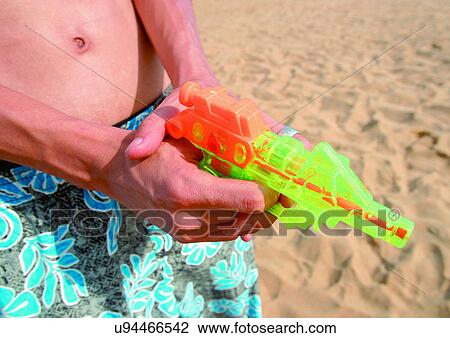 Stock Image - One Person, Outdoor, Sand. Fotosearch