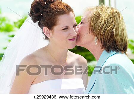 Stock Photograph - Smiling, Wedding Dress, Veil. Fotosearch