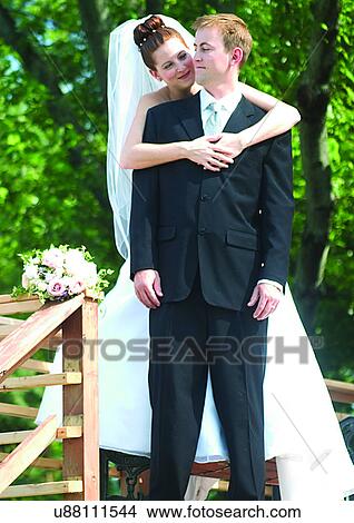 Standing, Smiling, Arm Around View Large Photo Image Picture - Standing, Smiling, Arm Around. Fotosearch