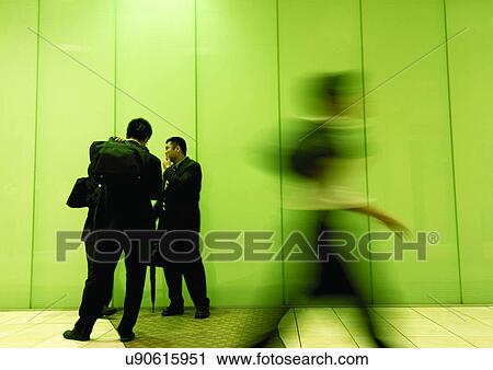 Stock Image - Walking, Blurred, Holding. Fotosearch