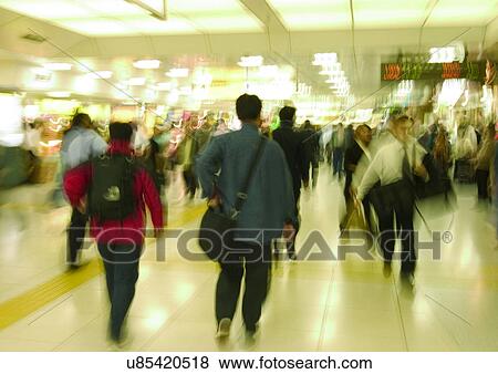 Stock Photo - Walking, Blurred, Indoor. Fotosearch